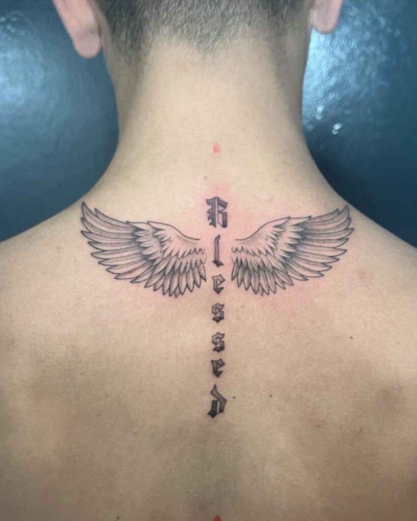 Elegant Full-Back Angel Wings with Falling Feathers Tattoo angel wings tattoo ideas on back tattoo