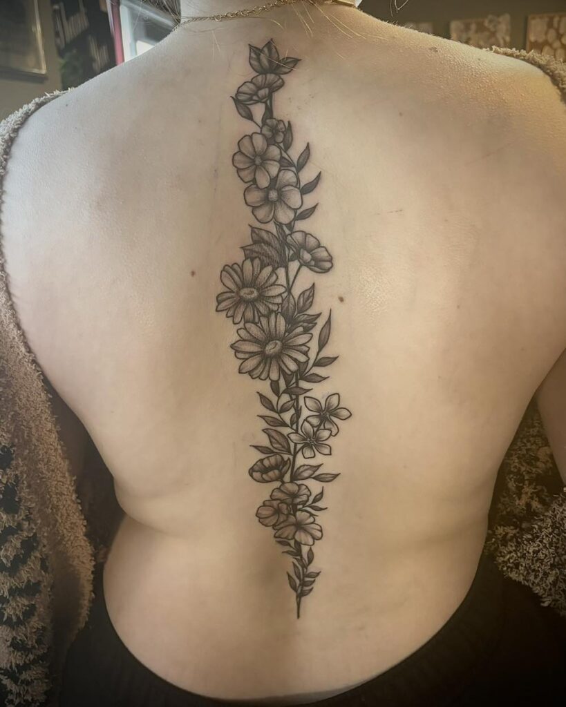 Flowing Cherry Blossom Spine Tattoo