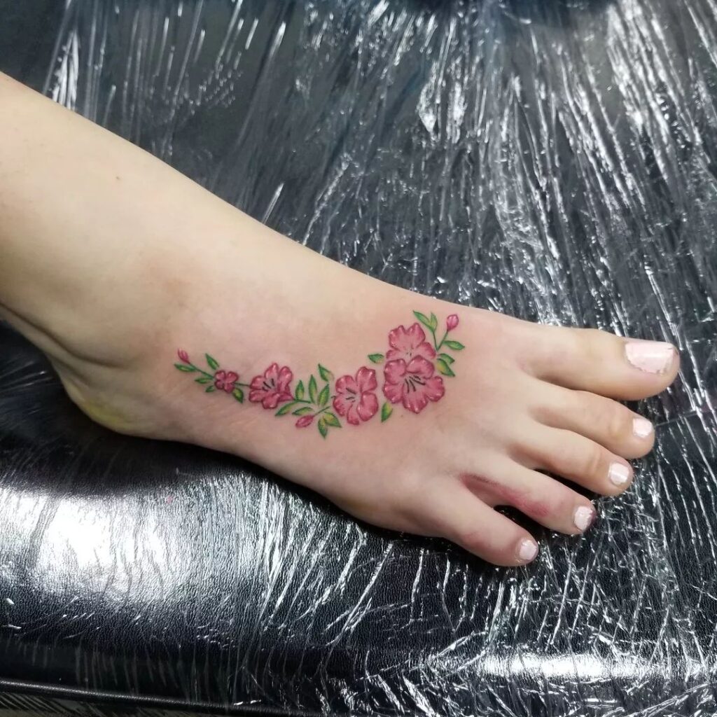 Floral Foot Tattoo With Sunflower And Hibiscus