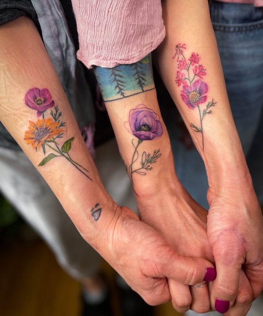 Blossoming Bond mother and daughter tattoo ideas tattoo