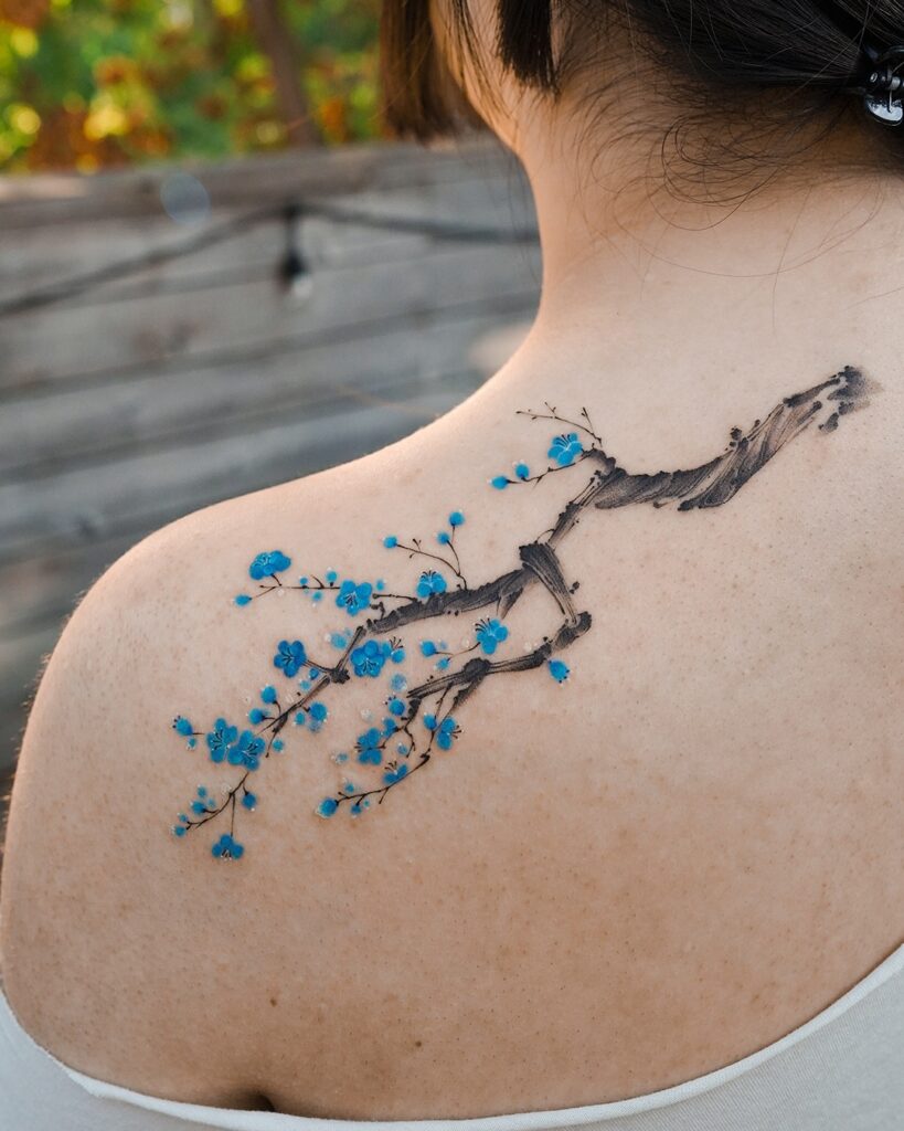 Bold Camellia Flower Shoulder Tattoo