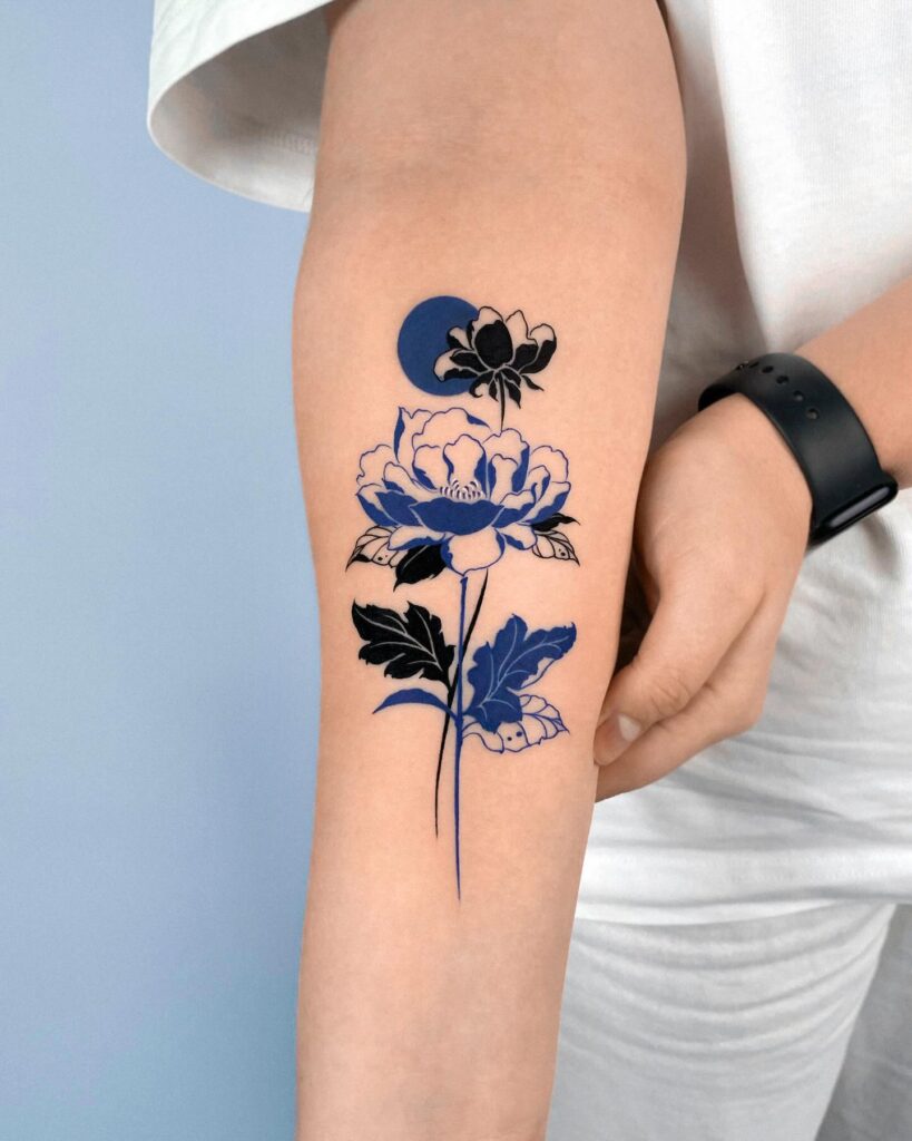 Blue Peony Tattoo with Minimalist Moon Accent peony flower tattoo ideas tattoo