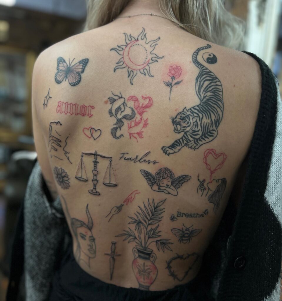 Bold Symbolic Patchwork Chest And Stomach Tattoo