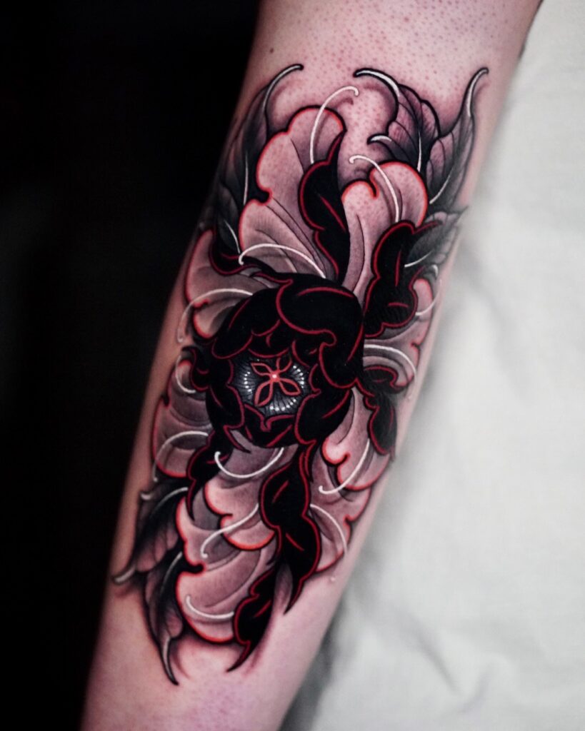 Bold Black and Red Peony Tattoo with Intricate Shading peony flower tattoo ideas tattoo