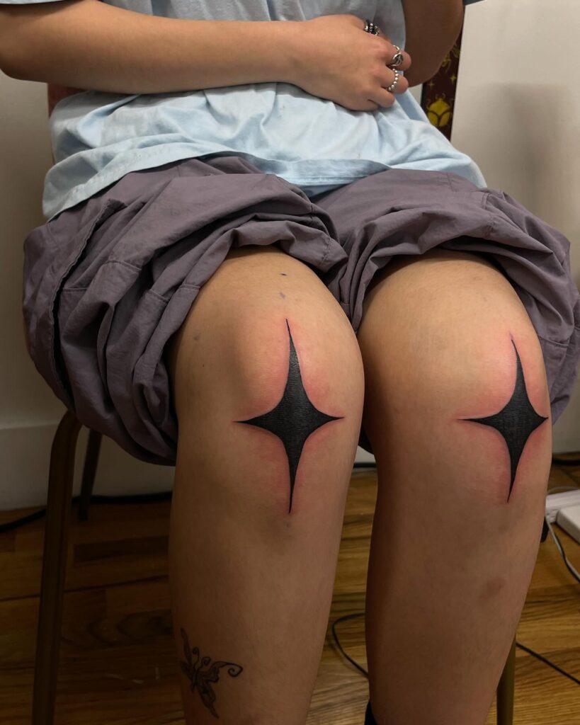 Red And Black Star Ankle Tattoo
