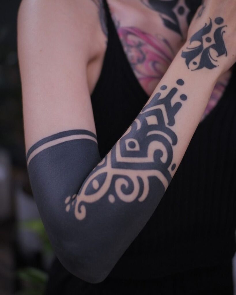 Black Ornamental Forearm Tattoo