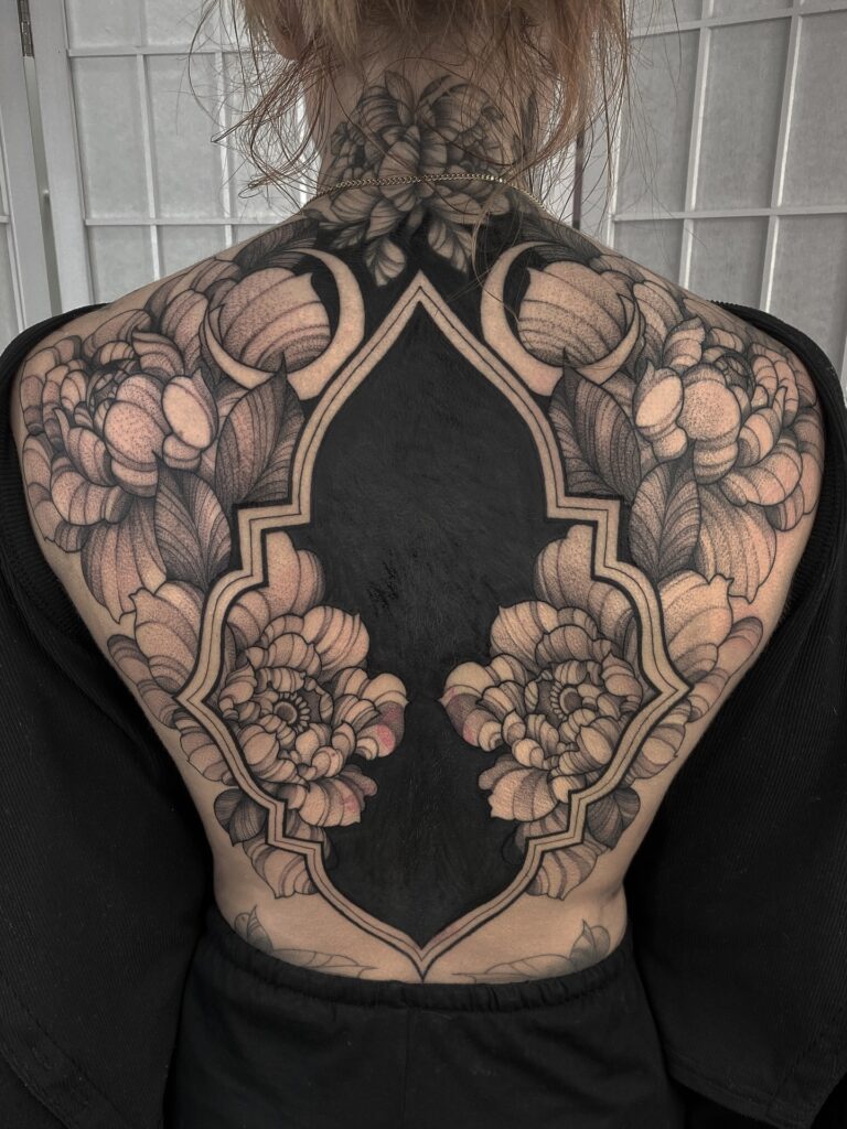 Soft Peony Back Tattoo With Flowing Arrangement