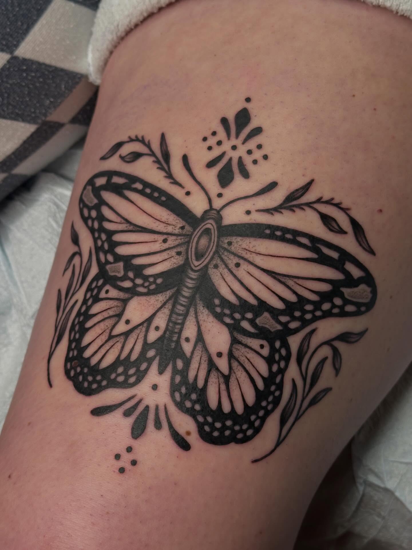 Bold Botanical Butterfly Thigh Tattoo butterfly tattoos designs tattoo