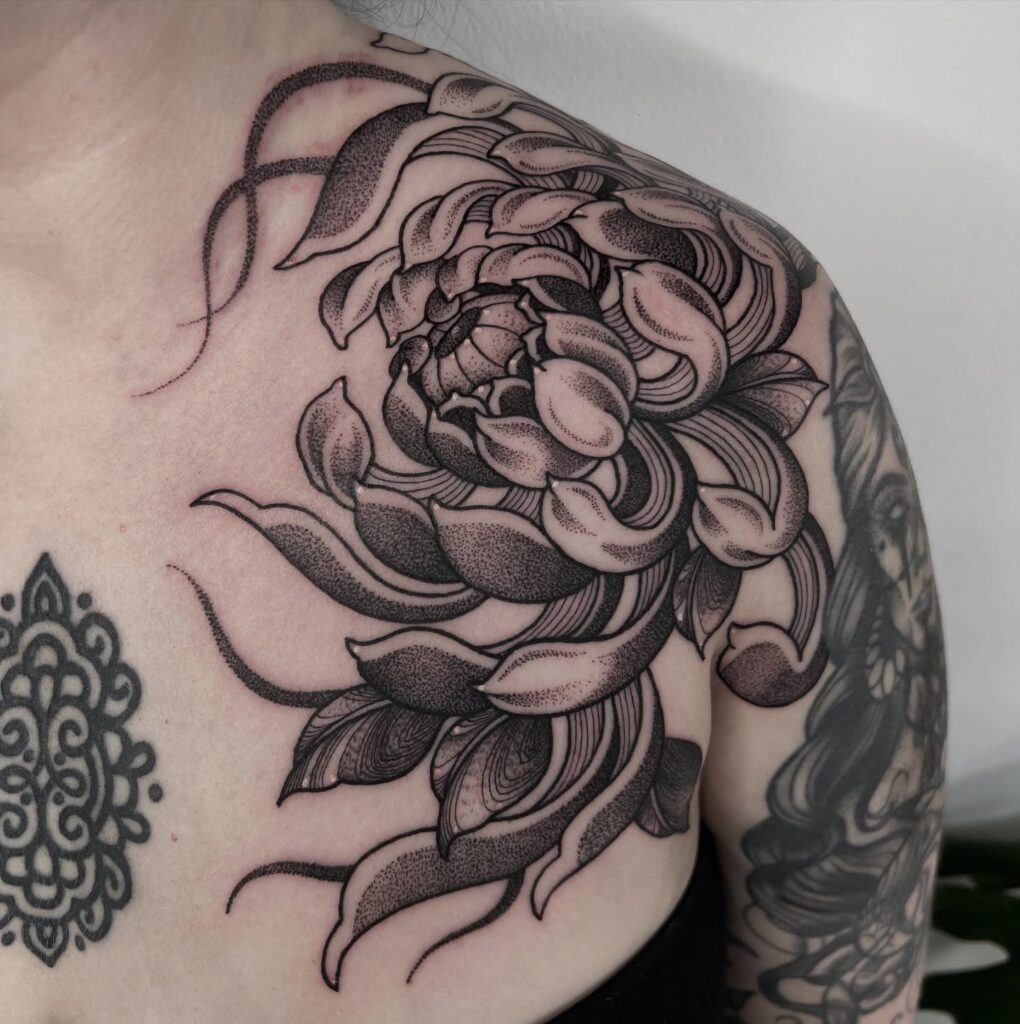 Bold Chrysanthemum Shoulder Tattoo women shoulder flower tattoo ideas tattoo