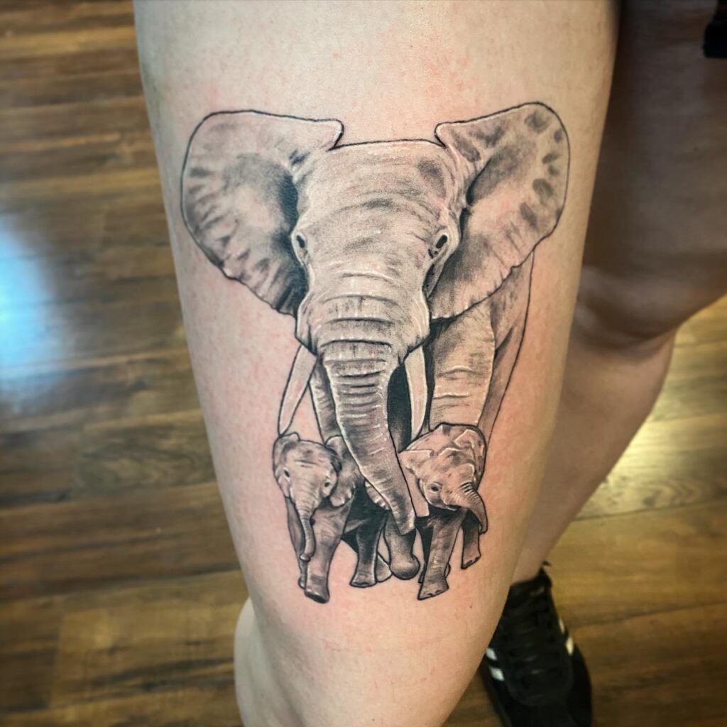 Bold Elephant Mother with Calves Tattoo elephant family tattoo ideas tattoo