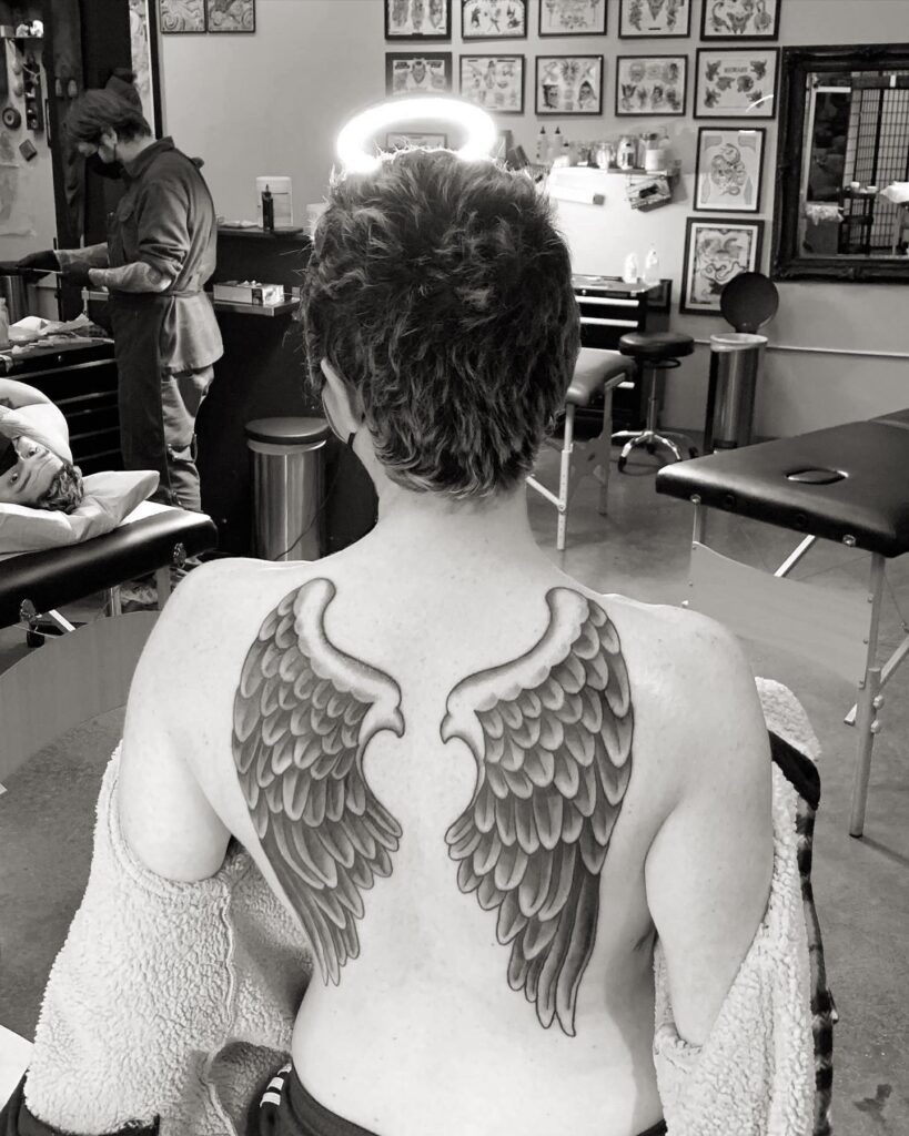 Bold Feathered Angel Wings Back Tattoo angel wings tattoo ideas on back tattoo
