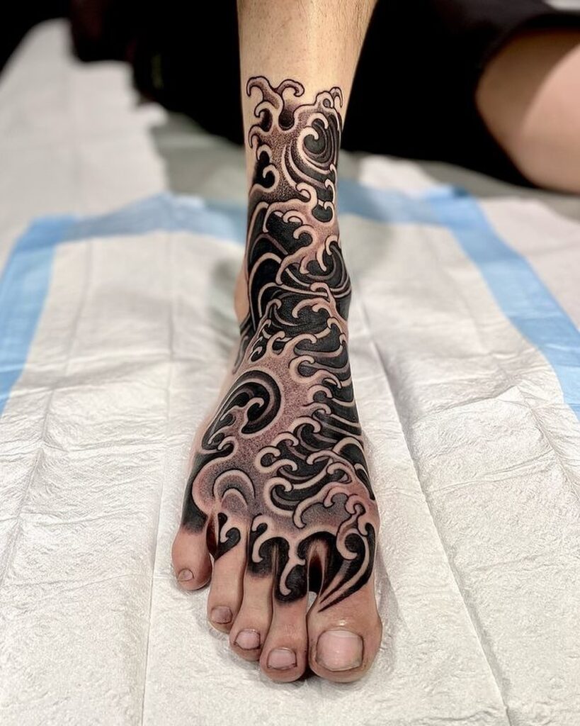 Minimalist Black Snake Foot Tattoo