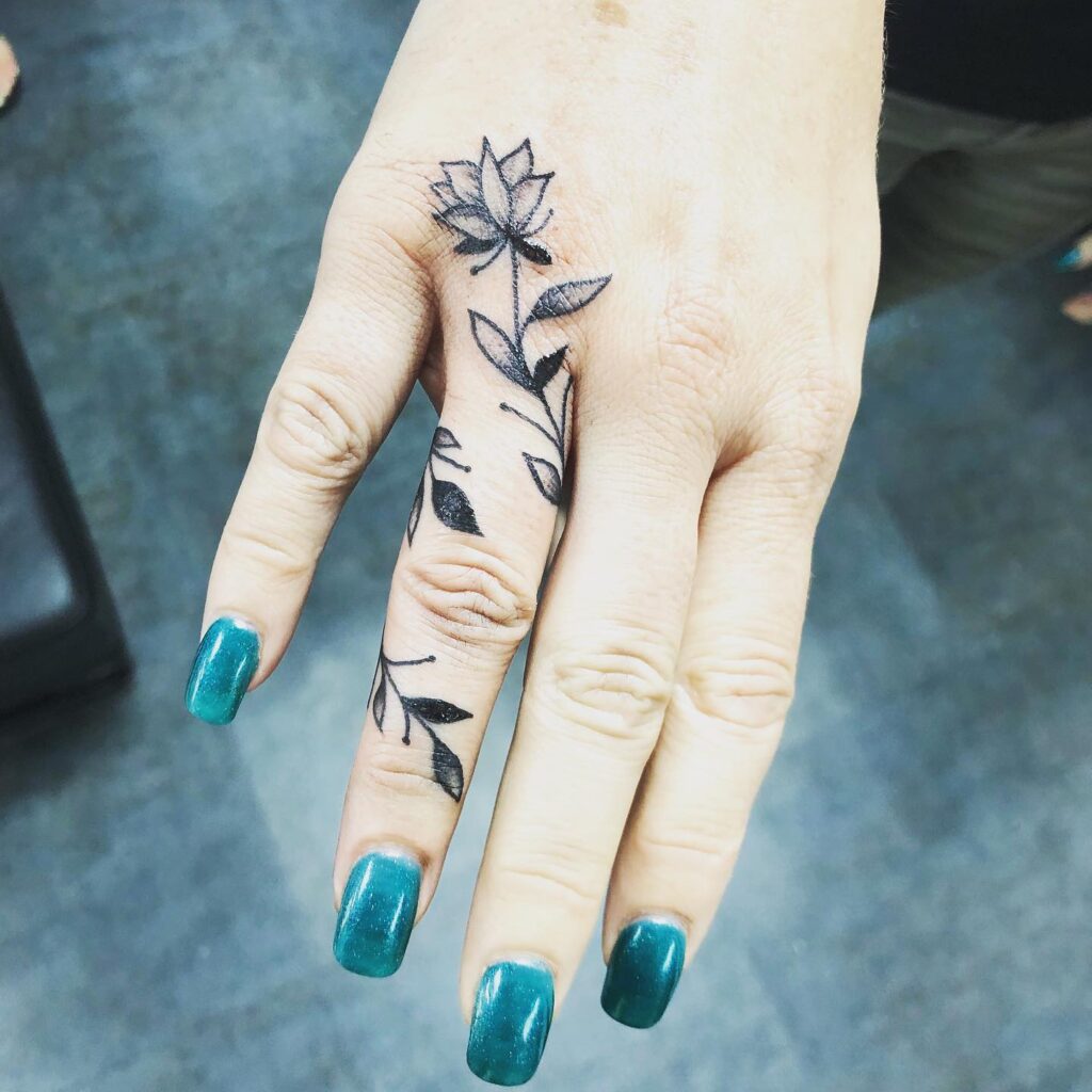 Leaf, Heart, And Star Finger Tattoos