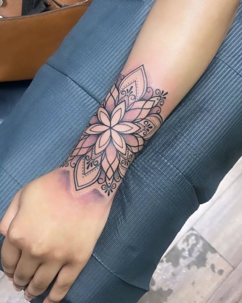 Bold Mandala Flower Wrist Tattoo mandala wrist tattoo ideas tattoo