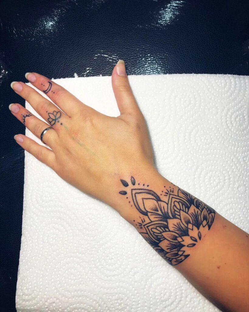 Crescent Moon And Lotus Wrist Tattoo