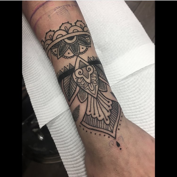 Bold Ornamental Mandala Wrist Tattoo mandala wrist tattoo ideas tattoo