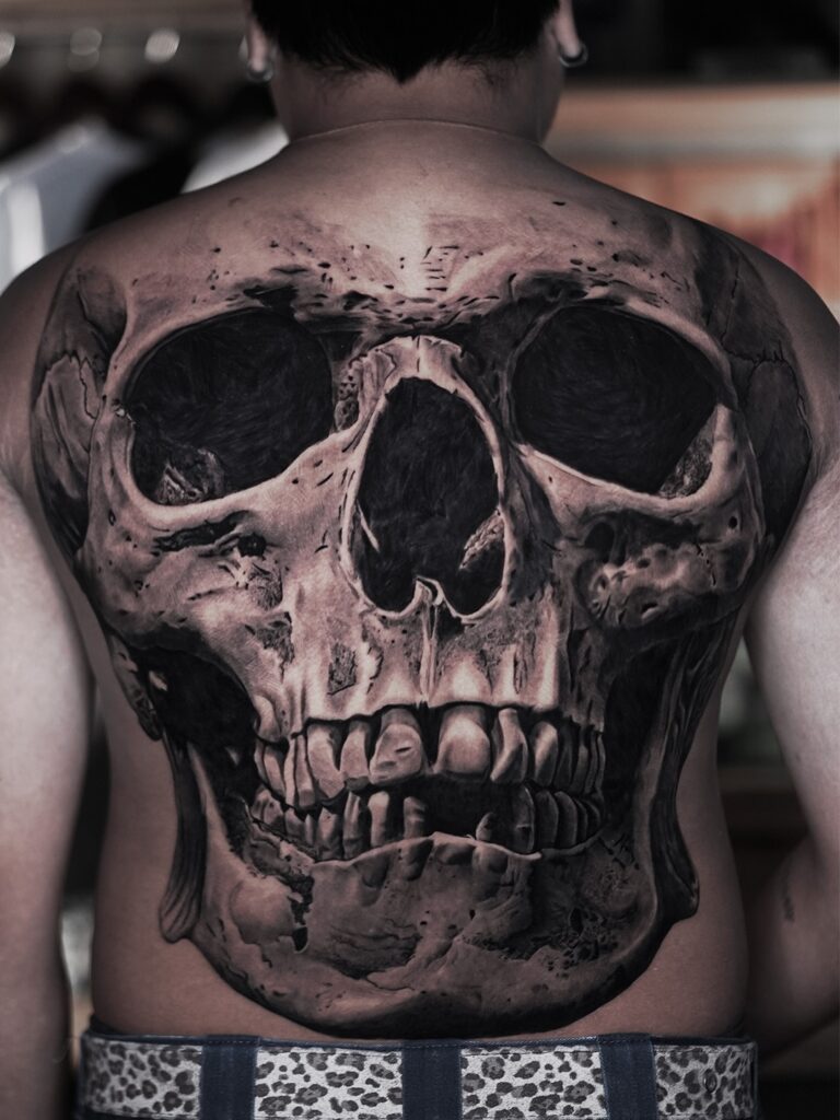 Bold Realistic Skull Full Back Tattoo back tattoos for guys tattoo