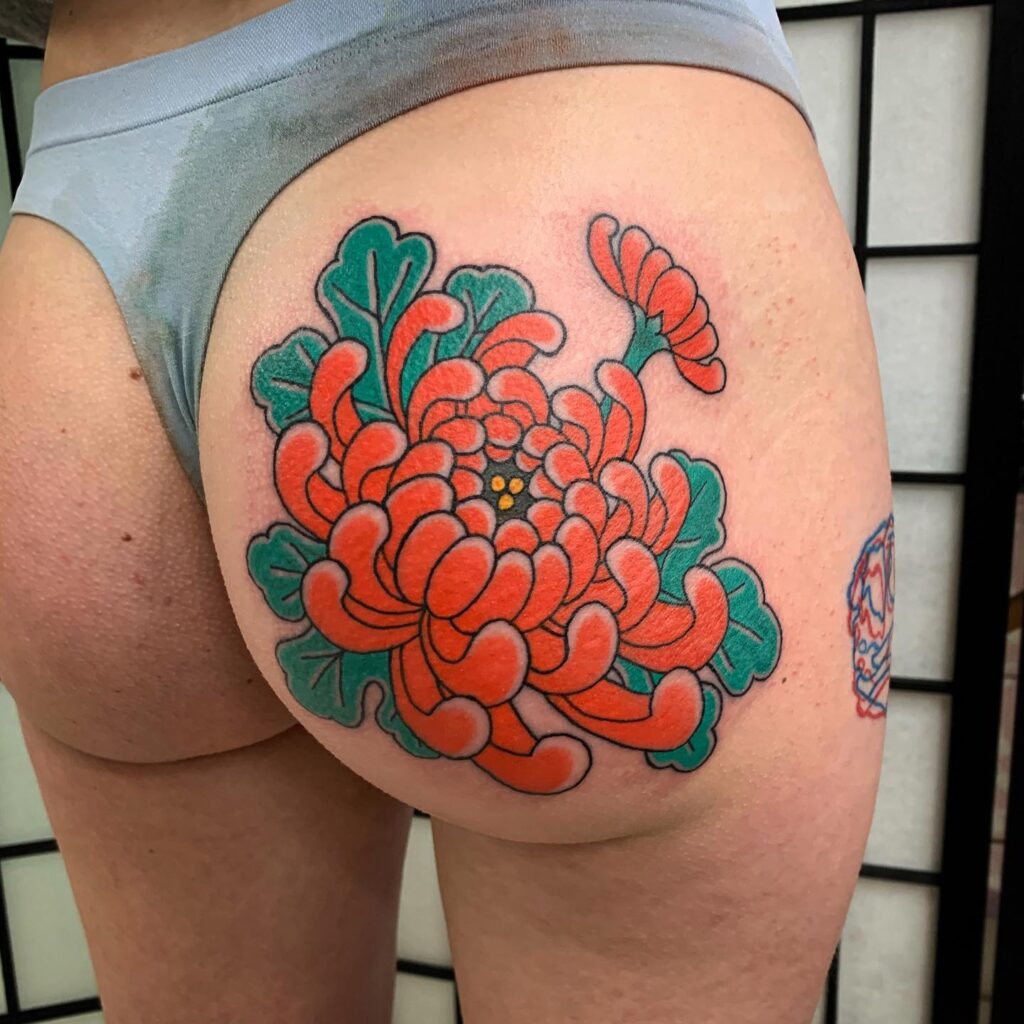 Bold Red Peony Hip Tattoo with Graphic Leaves japanese peony tattoos tattoo