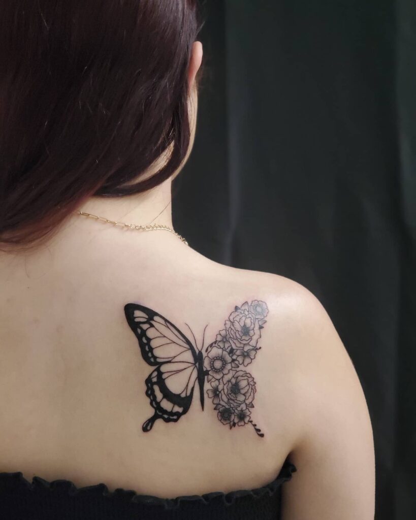 Bold Shoulder Butterfly and Floral Back Tattoo half butterfly half flower tattoos tattoo