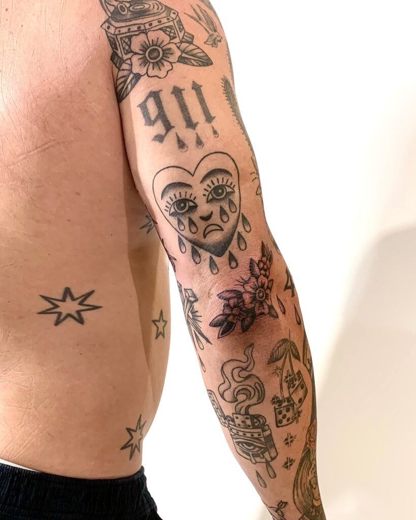 Baroque-Inspired Patchwork Tattoo Sleeve