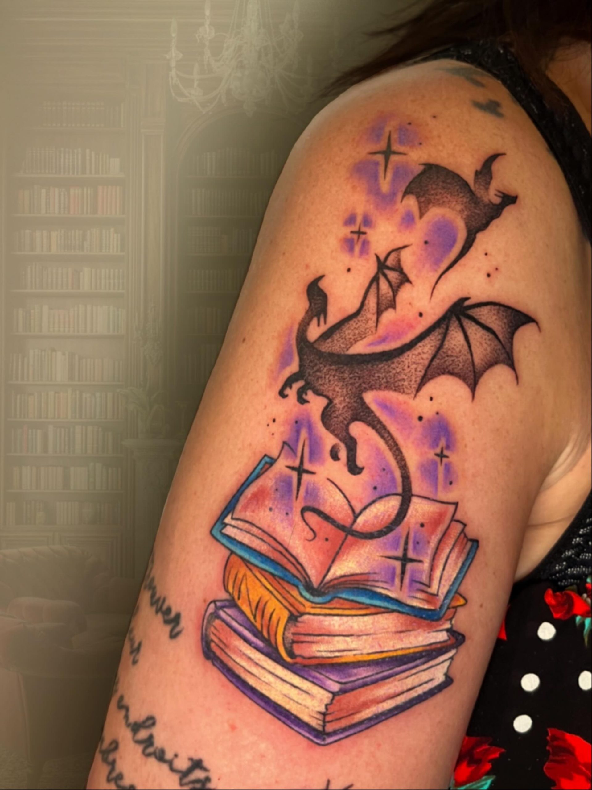 Dragon Rising From Open Book Tattoo