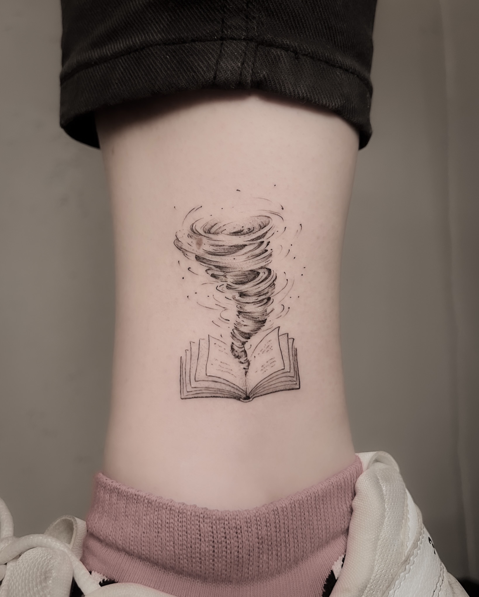 Open Book With Tornado Tattoo