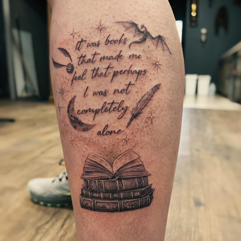 Books with Dragon, Mountains, and Stars Tattoo book lover tattoos tattoo