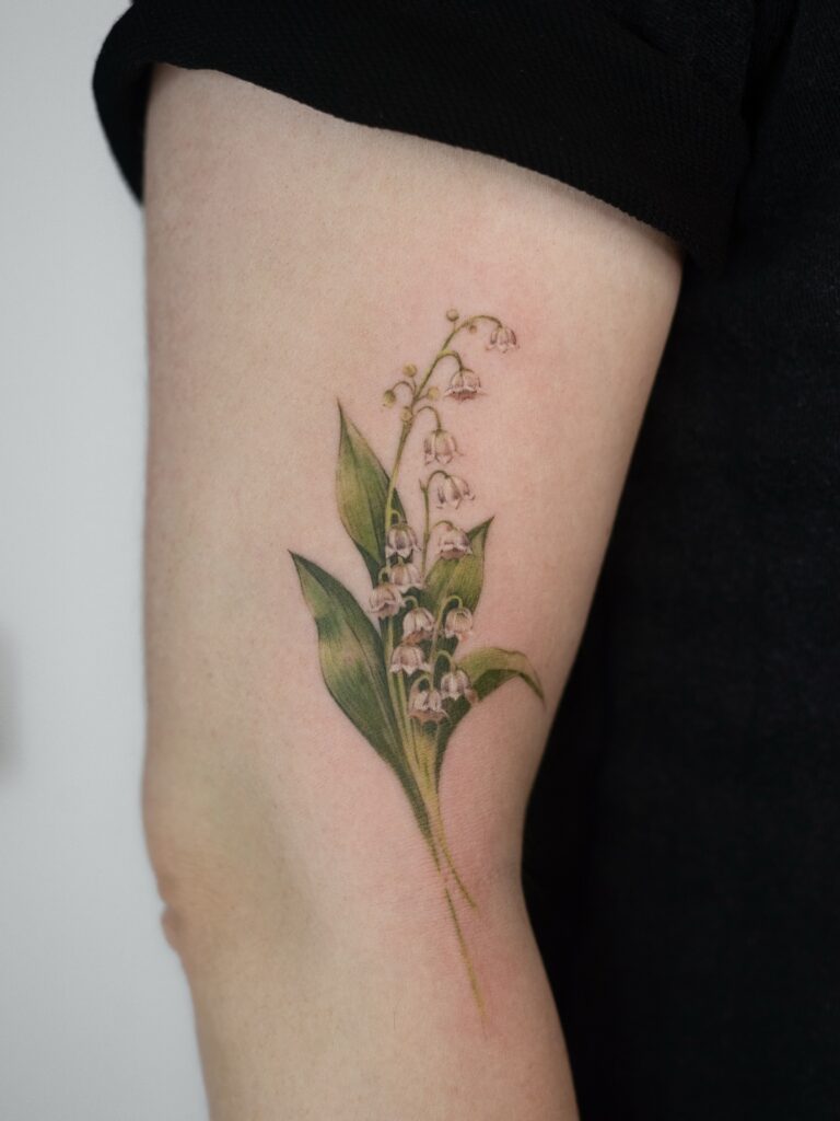 Botanical Lily of the Valley Tattoo in Watercolor Style may birth flower tattoos tattoo