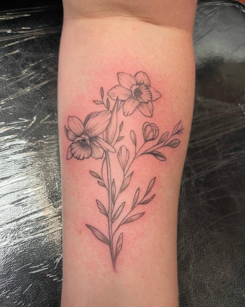 Botanical Narcissus and Foliage Tattoo december birth flower tattoo ideas tattoo