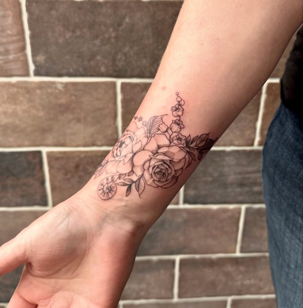 Botanical Wrist Garden Tattoo flower wrist tattoo ideas tattoo