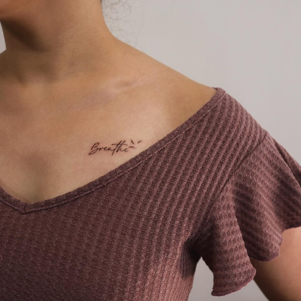 Elegant Ornamental Collarbone Tattoo