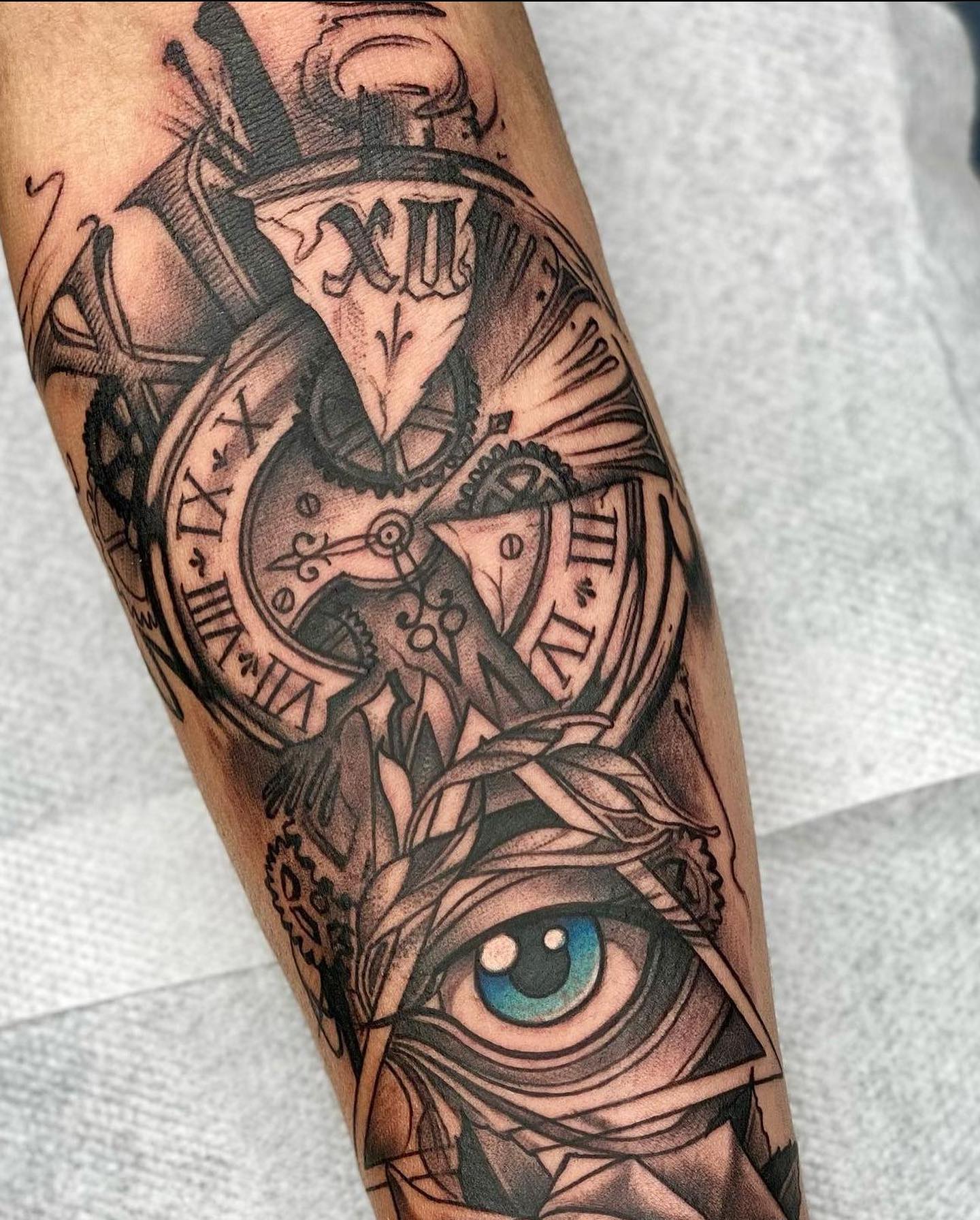 Broken Clock and Blue Eye Tattoo clock tattoo ideas tattoo