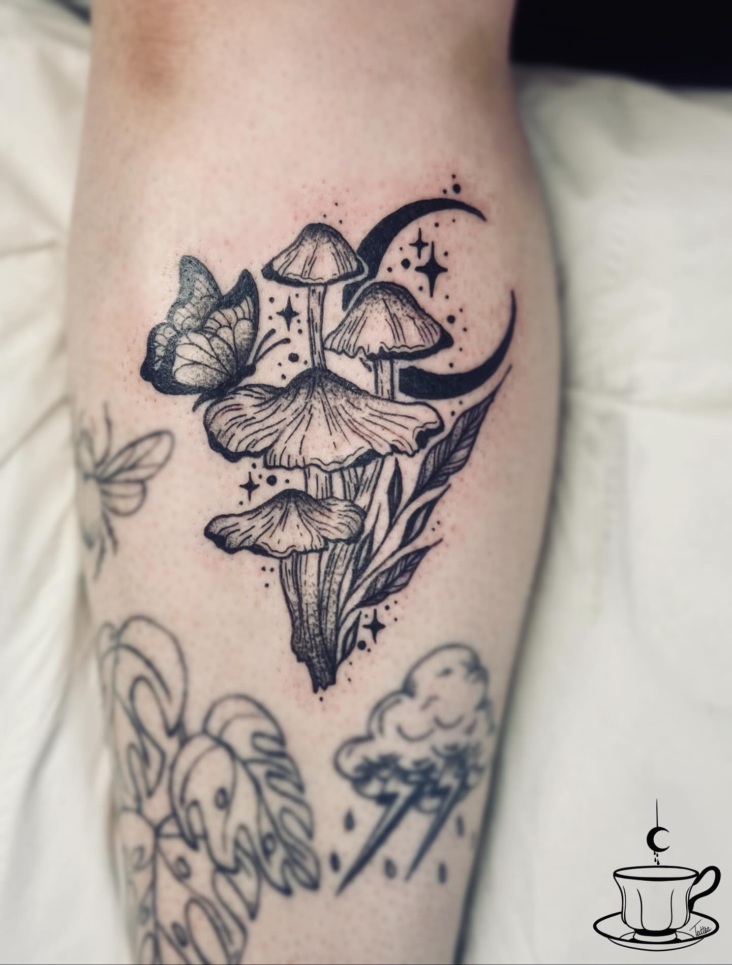Moon and Stars Mushroom Tattoo with Leaf Details mushroom tattoo ideas tattoo