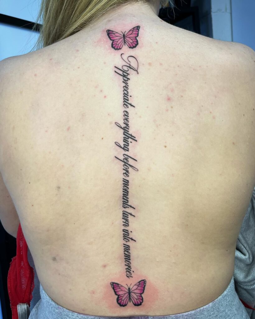 Regal Lion Spine Tattoo