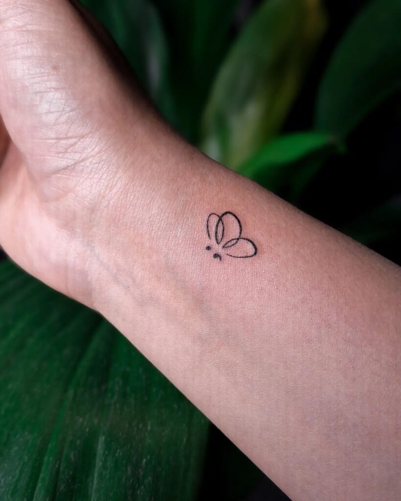 Butterfly Semi-Colon Tattoo meaningful semicolon tattoo ideas tattoo