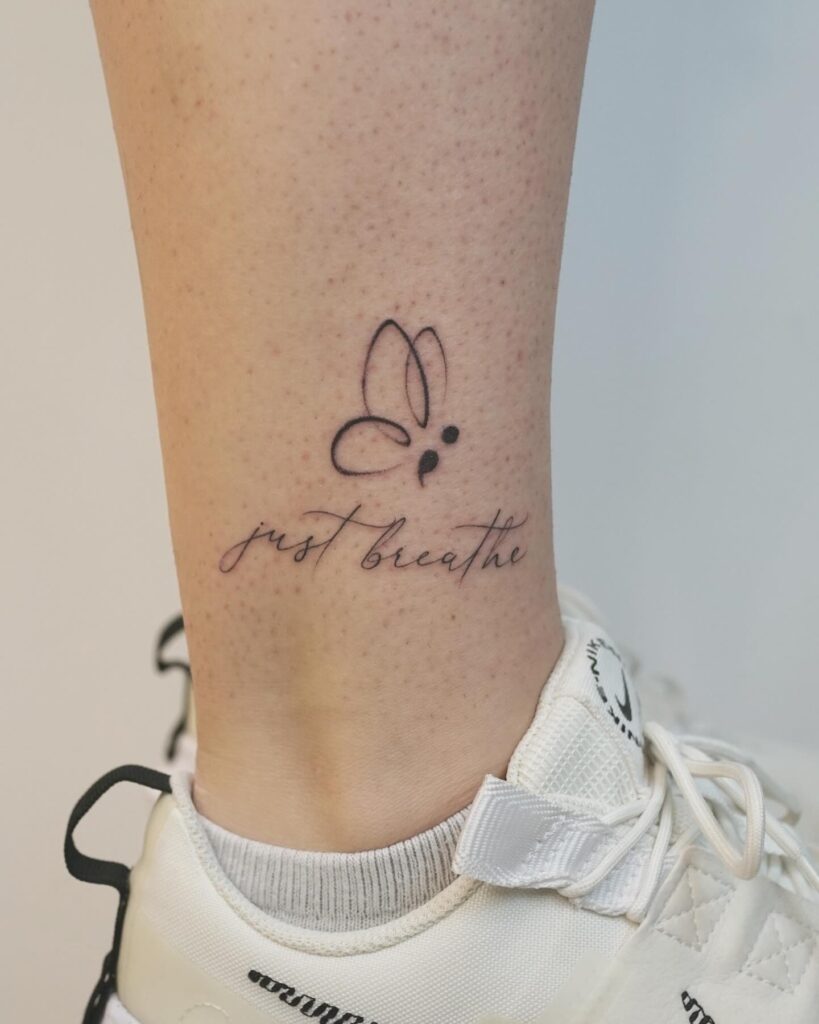 Butterfly Semi-Colon with &ldquo;Just Breathe&rdquo; Tattoo meaningful semicolon tattoo ideas tattoo