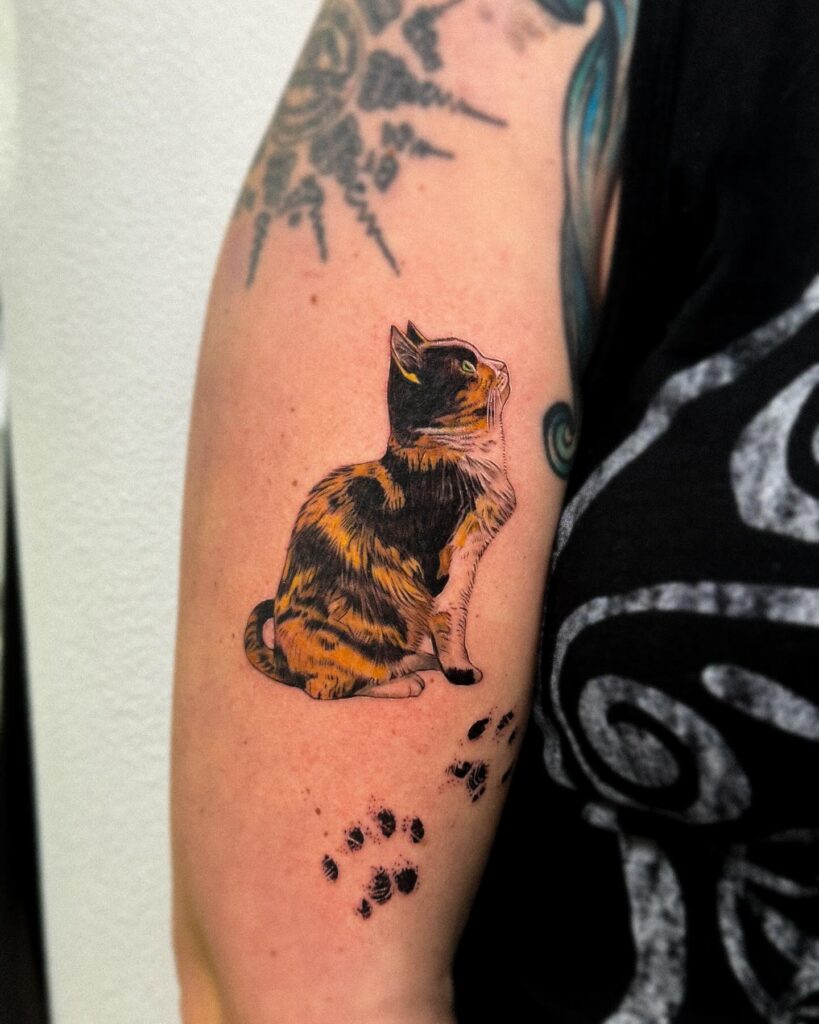 Cat Portrait with Paw Print Trail Tattoo paw print tattoo ideas tattoo