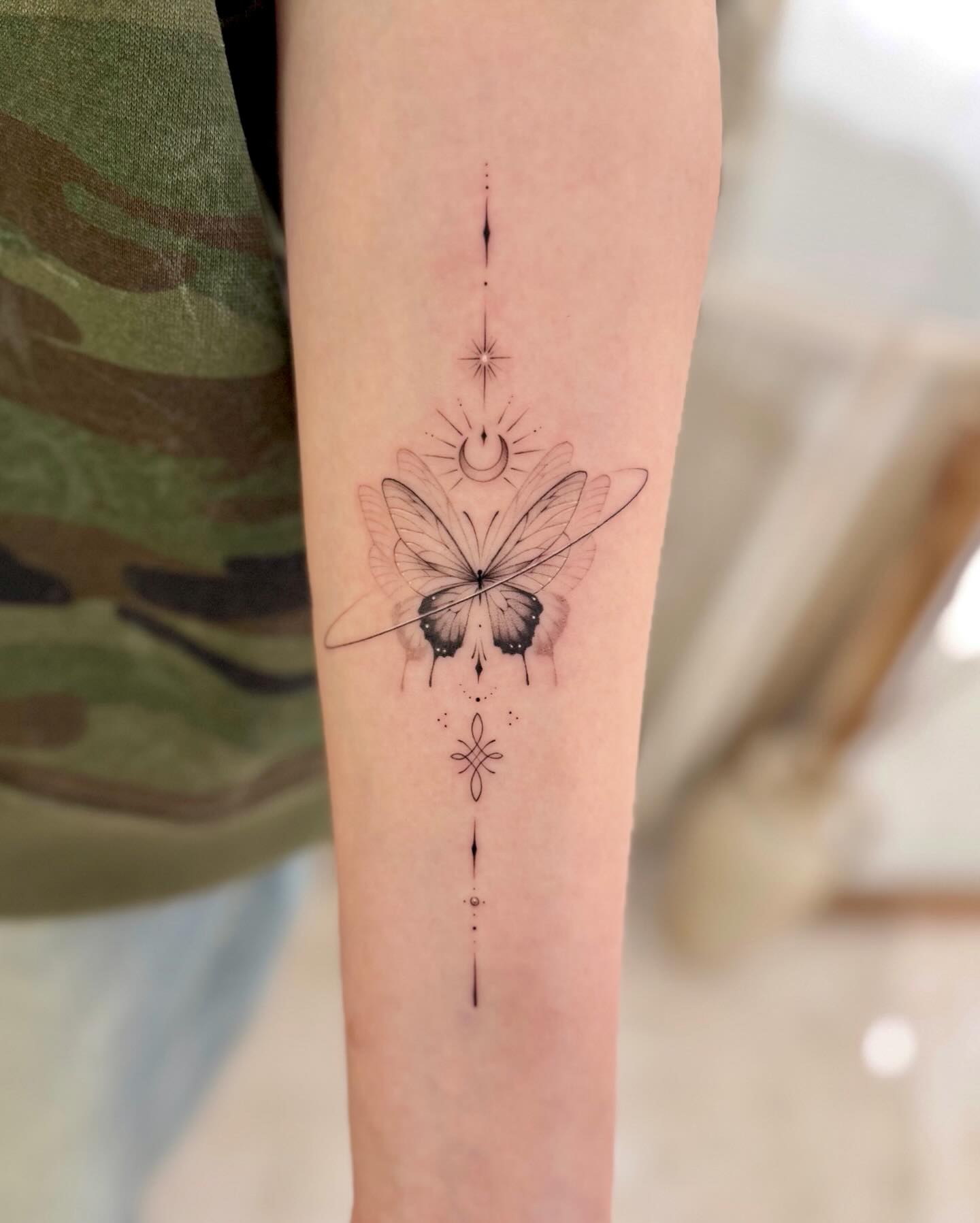 Celestial Butterfly Fine Line Tattoo fine line tattoo ideas with meaning tattoo