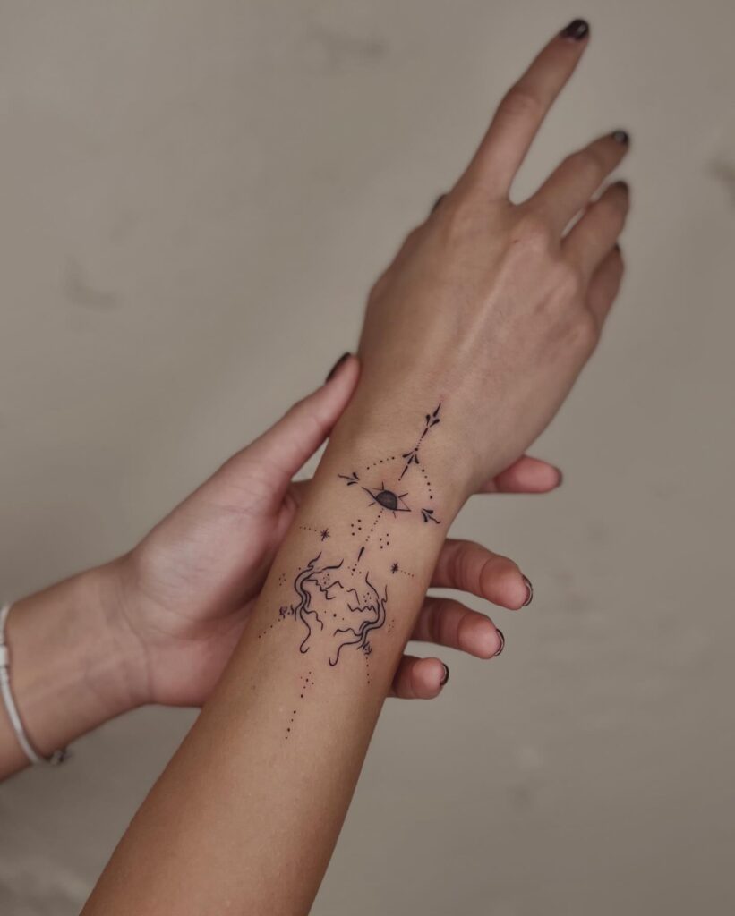 Butterfly Wrist Tattoo With Starry Accents