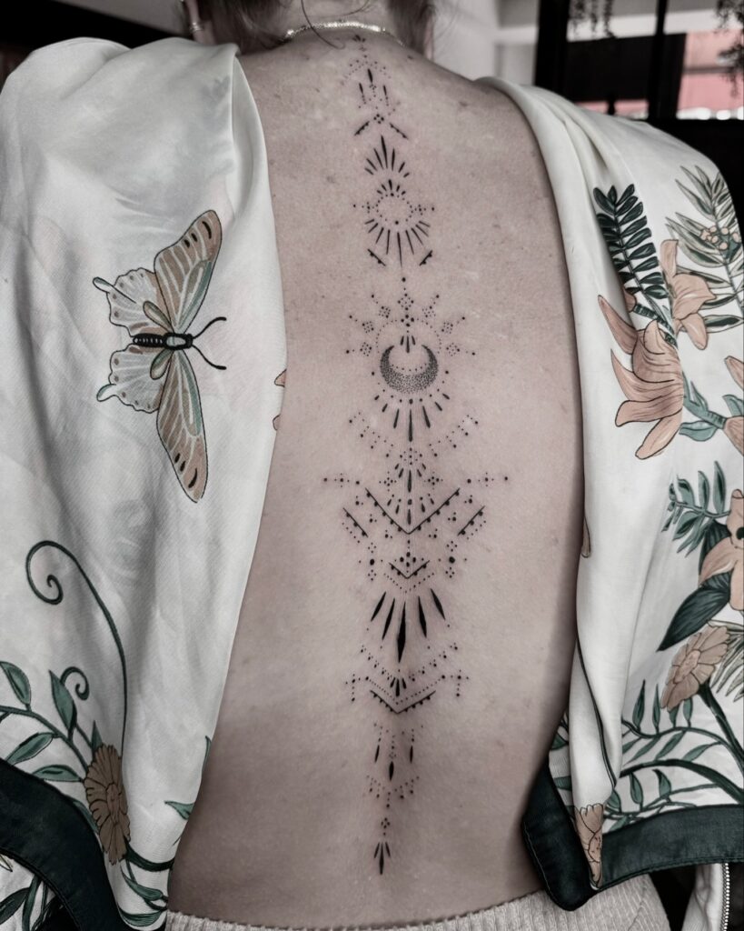 Birth Flower Spine Tattoo