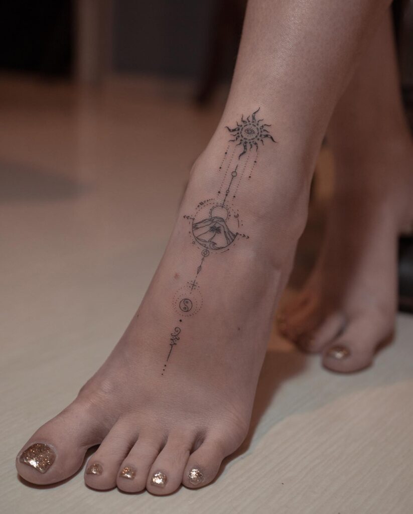 Celestial Harmony Foot Tattoo symbols tattoos tattoo