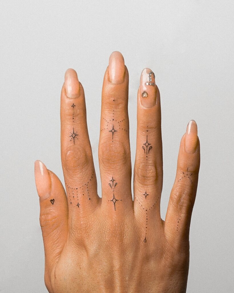 Butterfly And Leaf Finger Tattoos