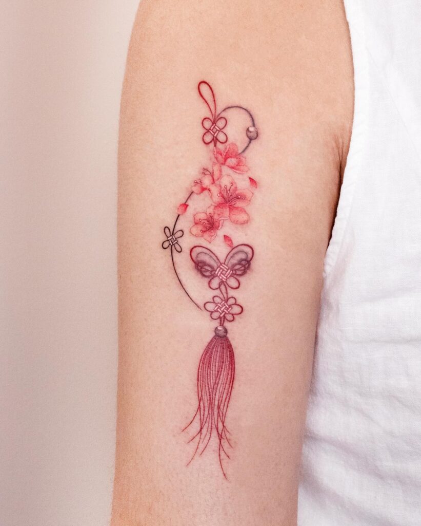 Cherry Blossom and Korean Knot Tattoo cherry blossom tattoo ideas tattoo