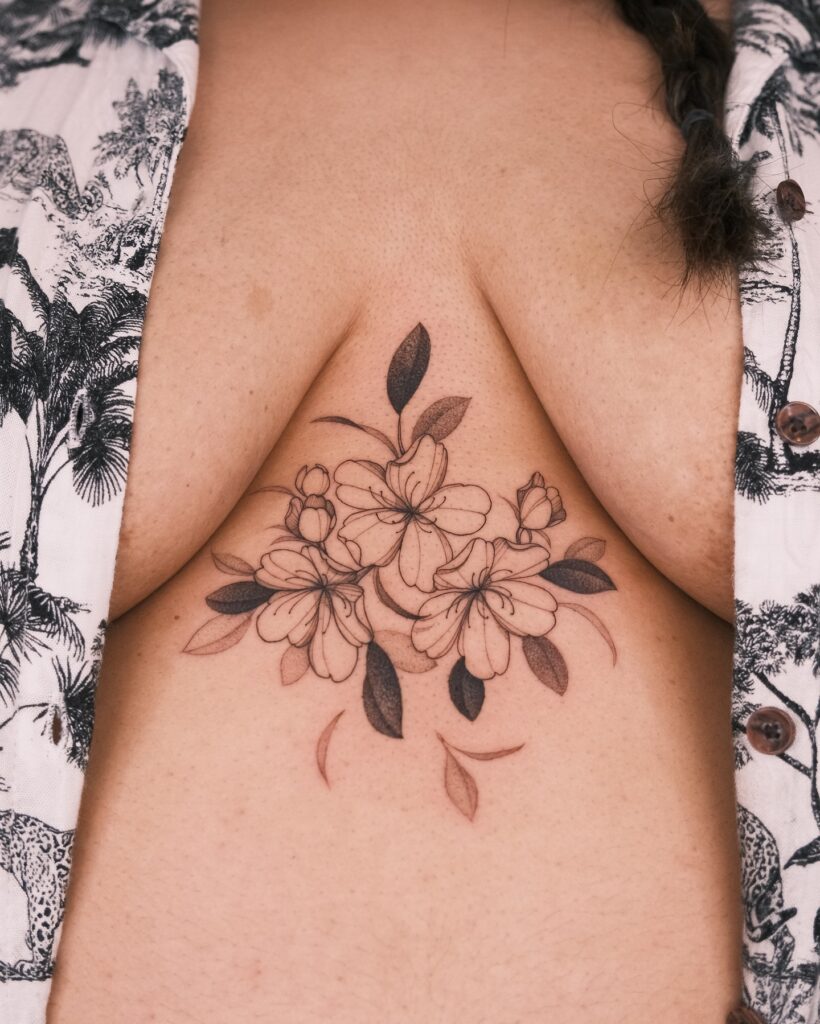 Cherry Blossom Sternum Tattoo cherry blossom tattoo ideas tattoo