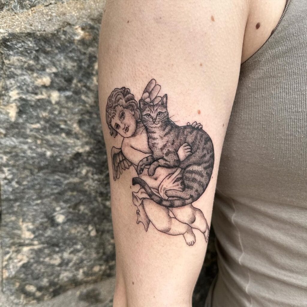 Cherub Cradling a Cat pet memorial tattoos tattoo