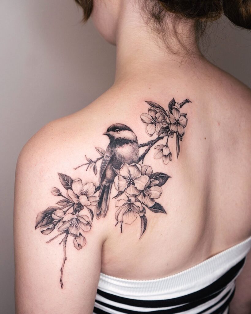Chickadee and Blossoms Shoulder Tattoo bird tattoo ideas for women with meaning tattoo