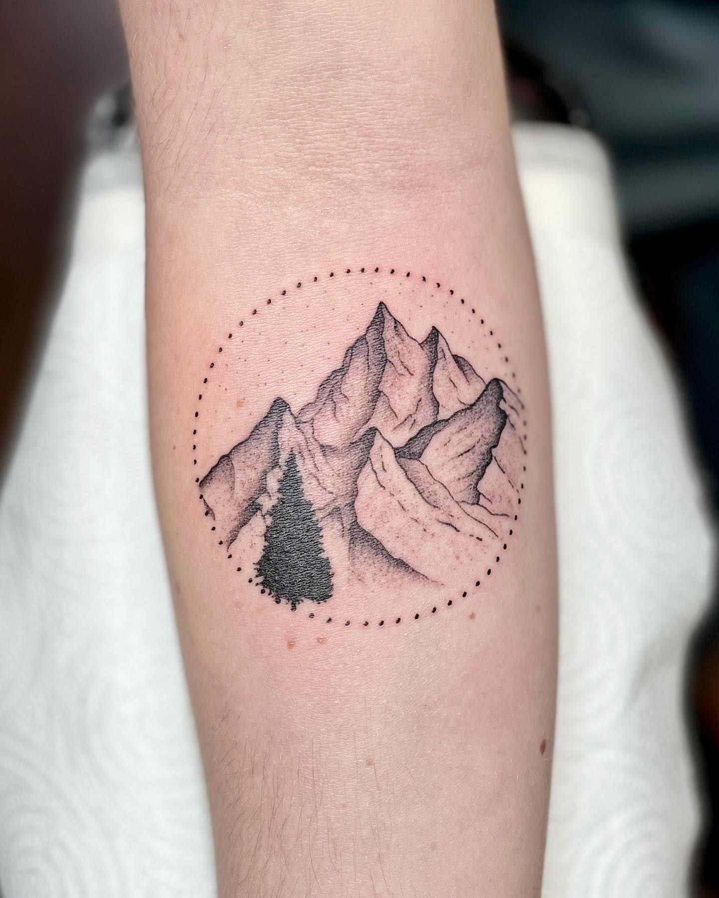 Circular Mountain Peaks Tattoo mountain tattoos ideas tattoo