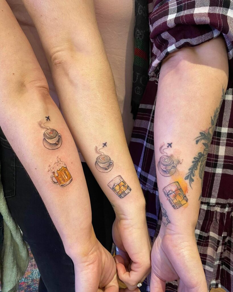Matching Hand And Heart Trio Tattoo