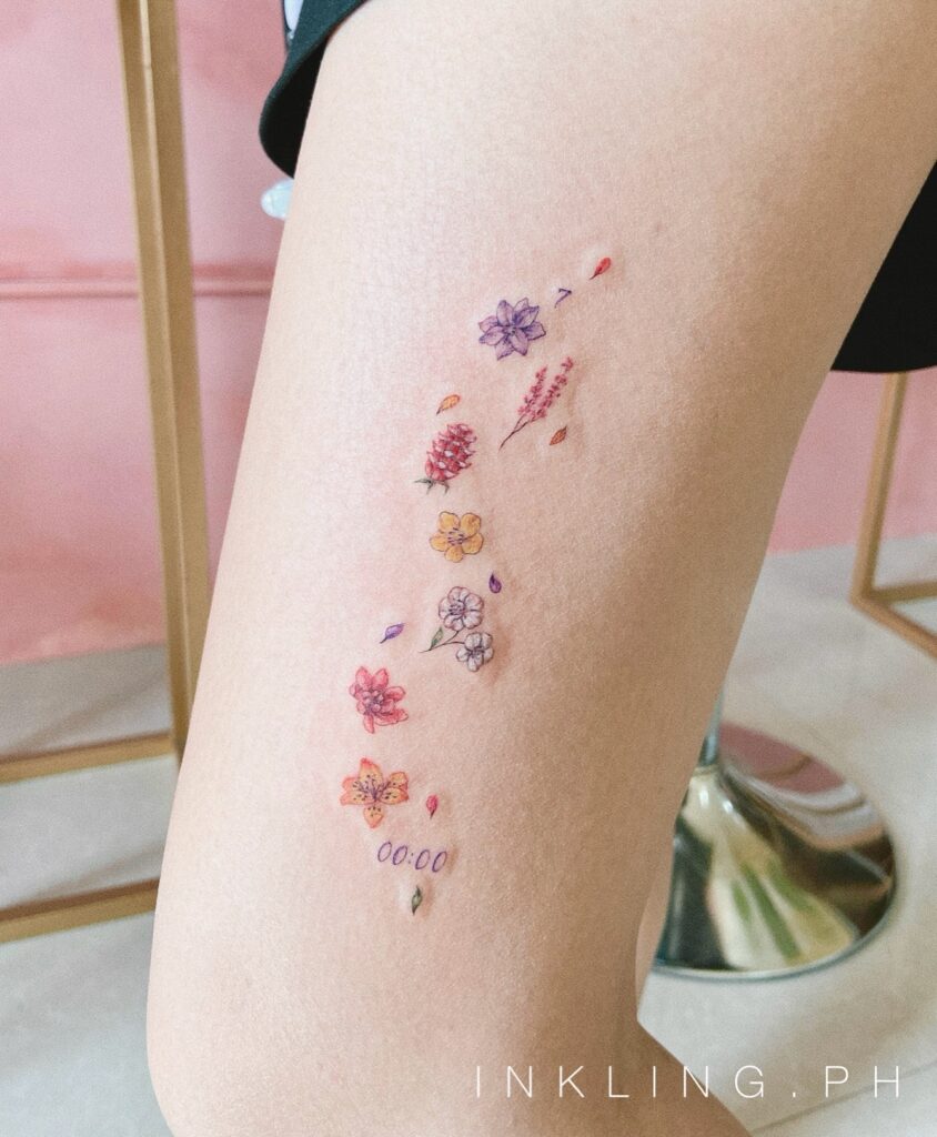 Colorful Birth Flower Trail Tattoo