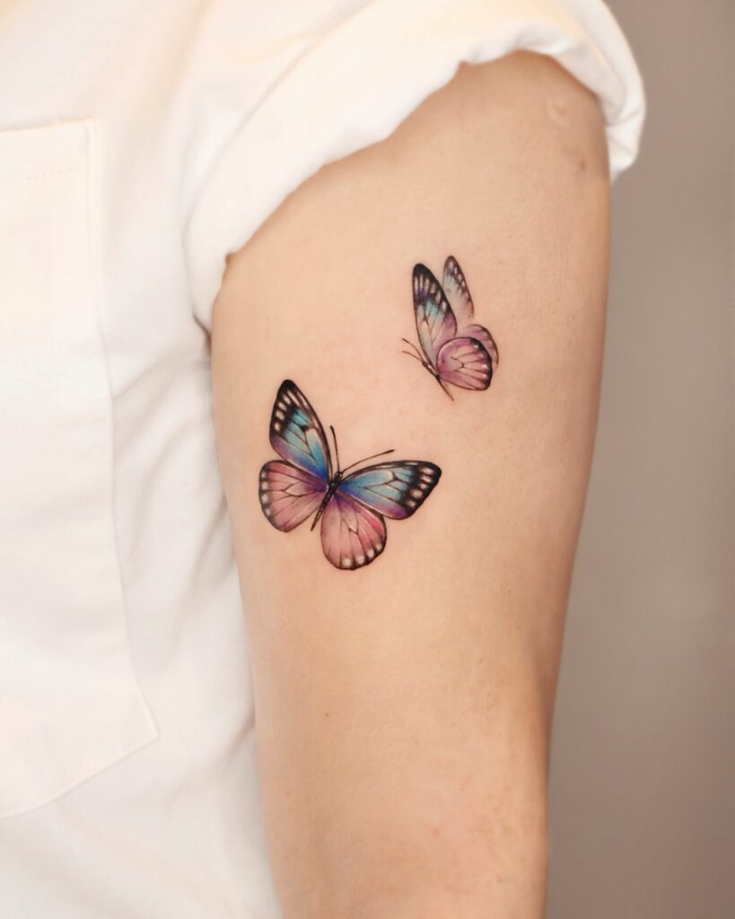 Colorful Butterfly Pair Tattoo butterfly tattoo designs tattoo